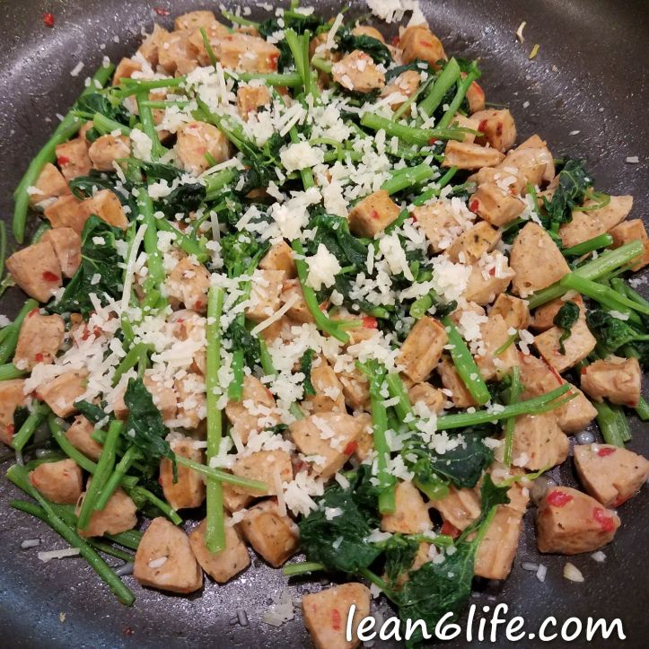 Garlic mustard with chicken sausage and Parmesan cheese