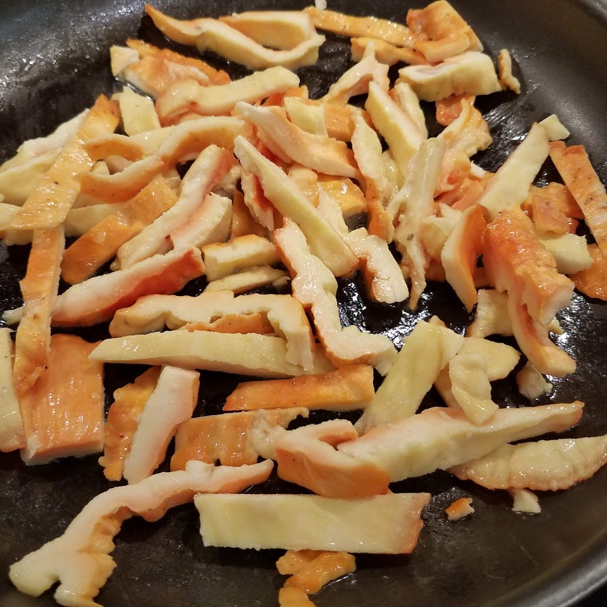 Cooking chicken of the woods in butter with salt and pepper