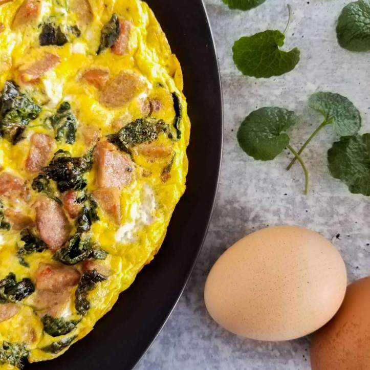 This frittata features hot Italian sausage paired with garlic mustard 