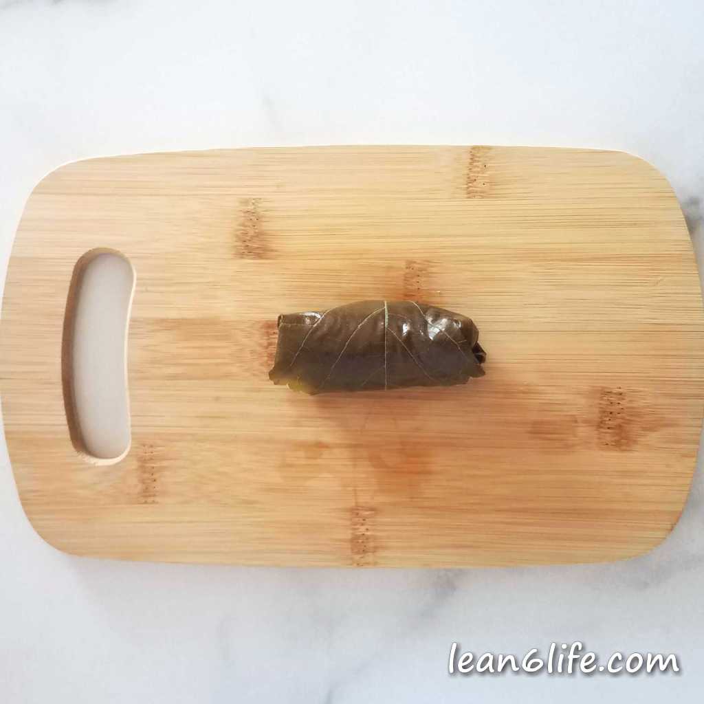 Ta da! A stuffed grape leaf, ready to cook