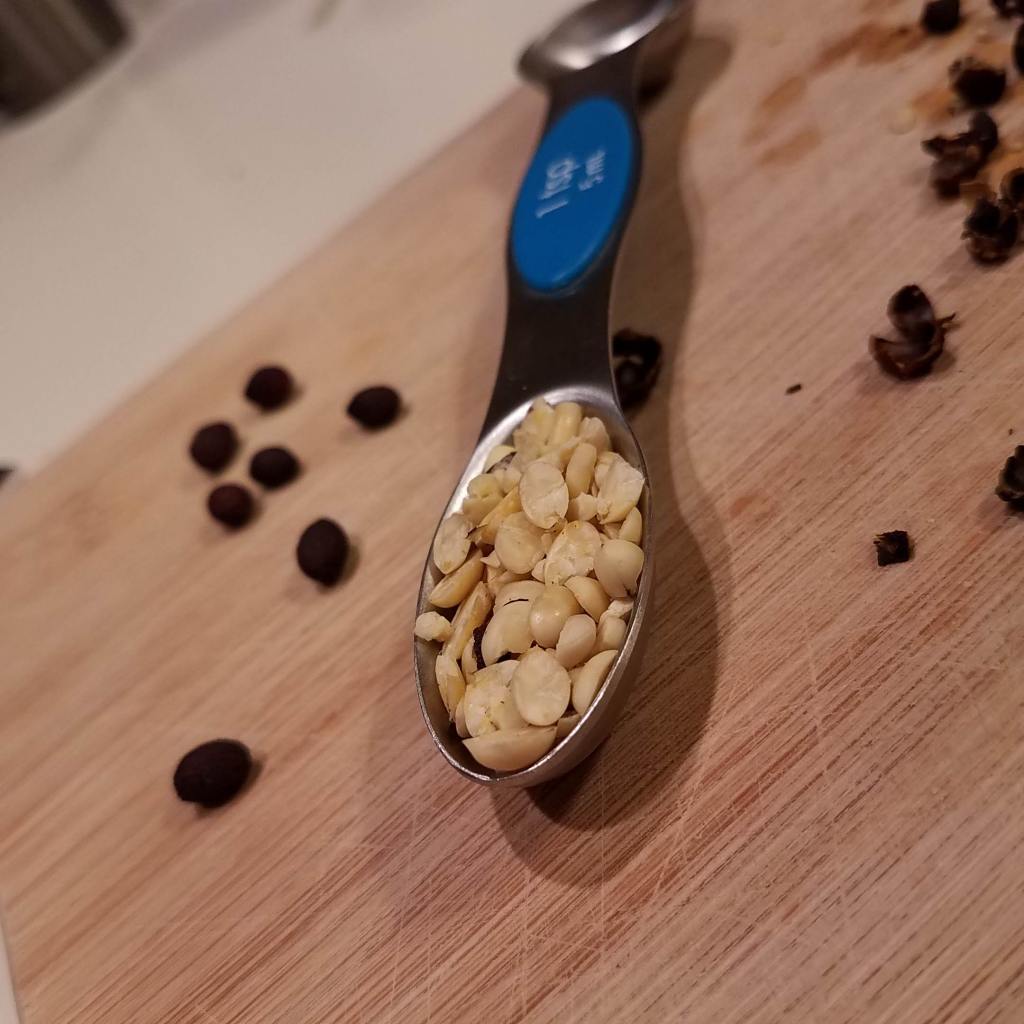A teaspoon of spicebush seeds freed from the rest of the berry