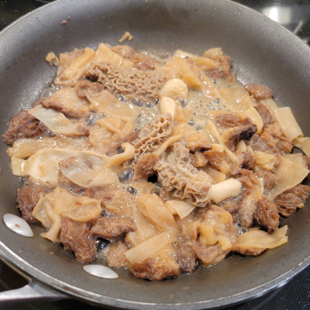 Morels cooking in butter